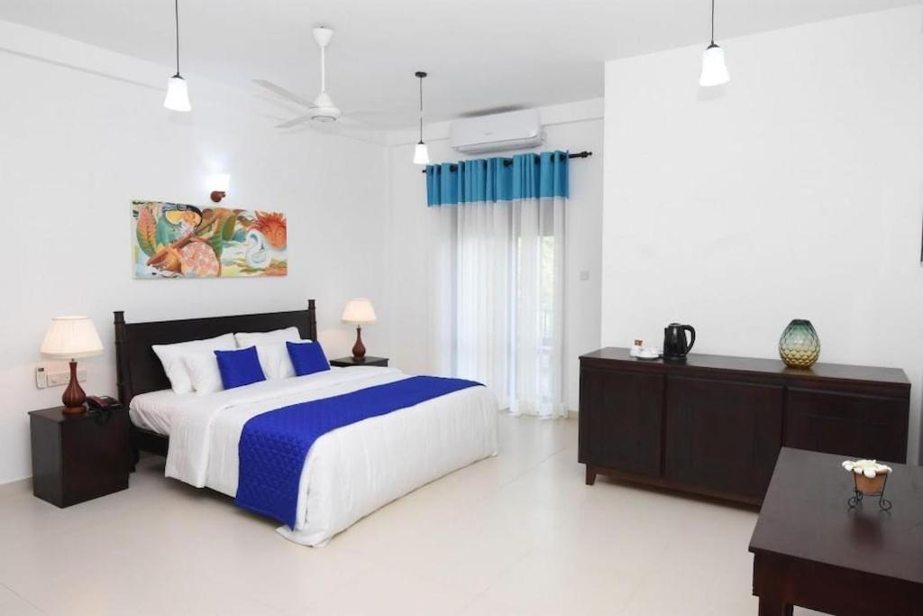 Blue Spring Hotel Wadduwa Chambre photo